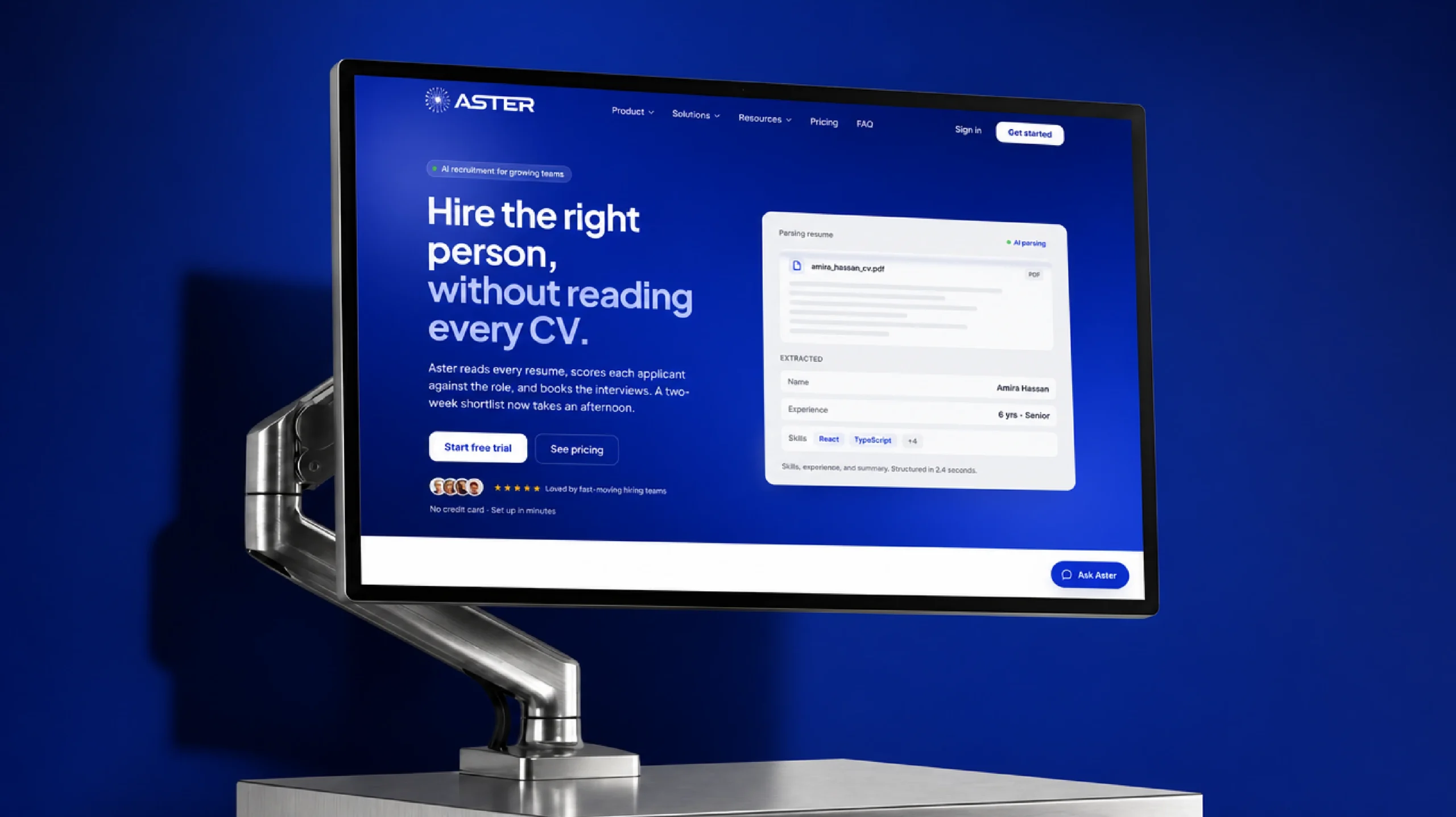Aster website on a desktop monitor